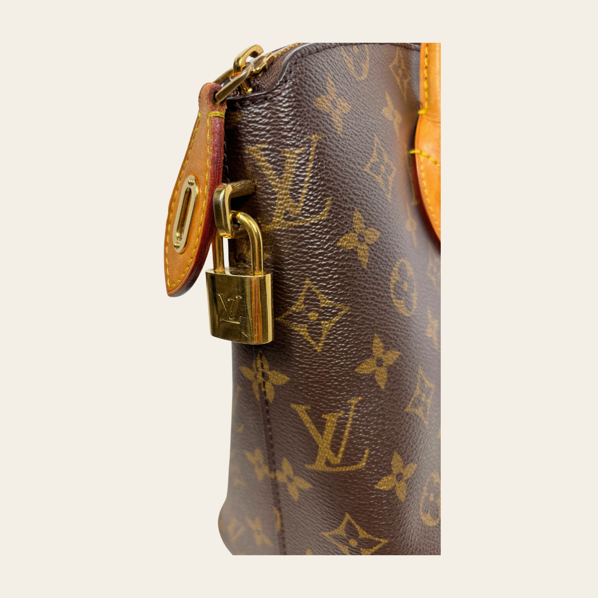 LOUIS VUITTON – Lockit PM Monogram Canvas, Cuir Vachetta