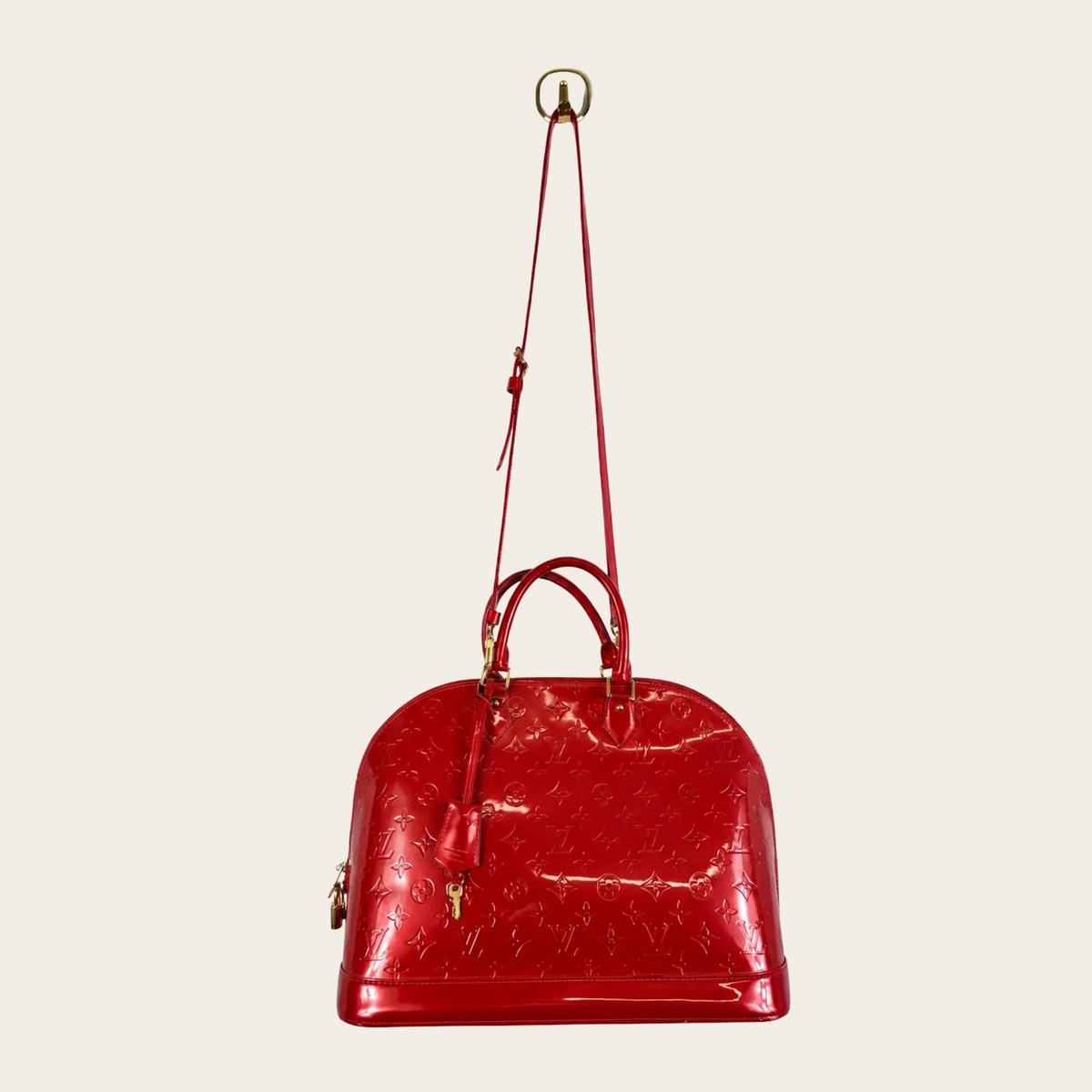 LOUIS VUITTON — Sac Alma GM en cuir Monogram Vernis Pomme d'amour