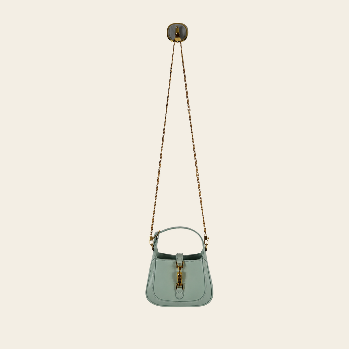 GUCCI — Sac Jackie 1961 Nano en cuir vert sauge avec fermoir piston doré et bandoulière chaîne, taille Nano
