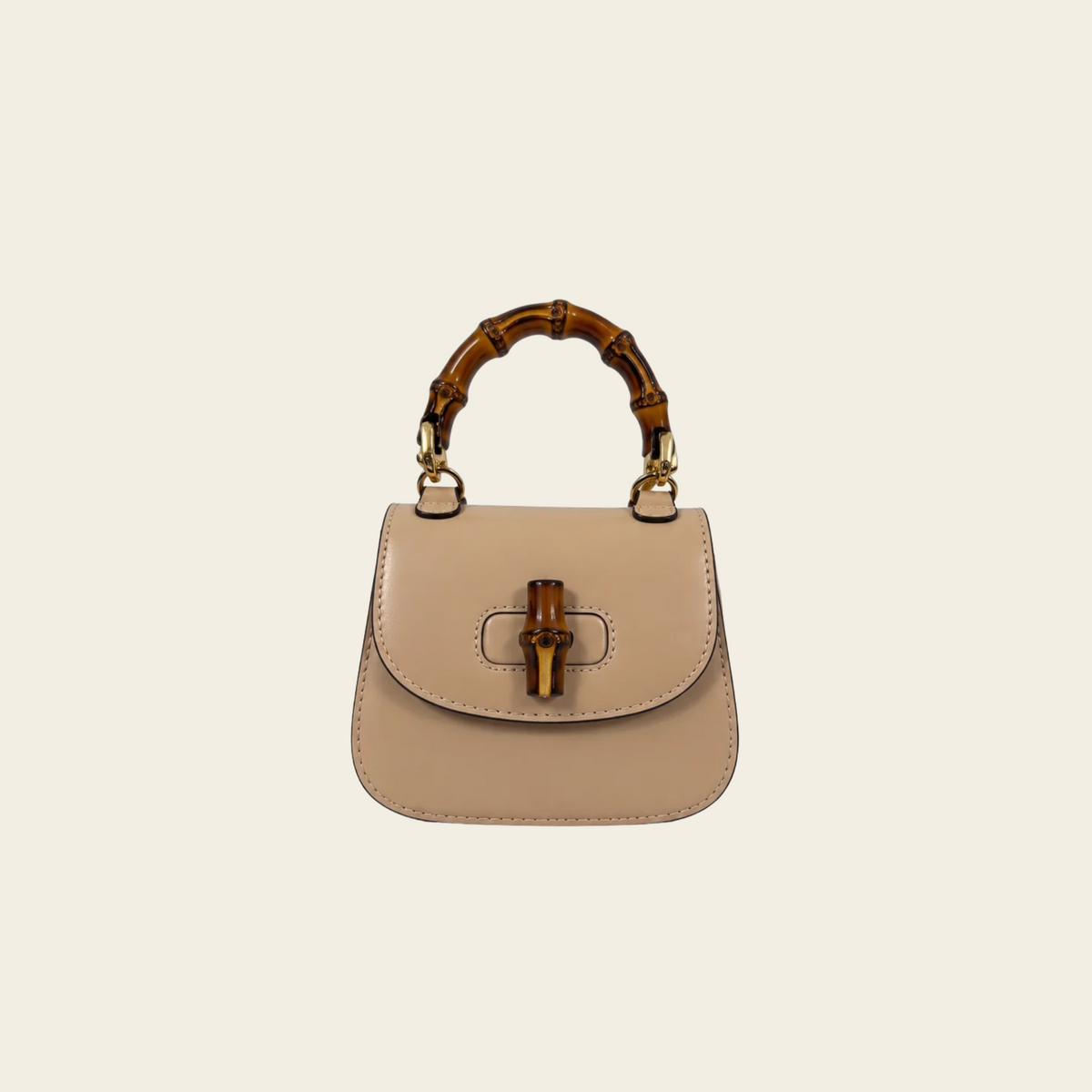 GUCCI — Sac Bamboo 1947 Nano en cuir beige nude avec anse en bambou et bandoulière chaîne dorée, taille Nano
