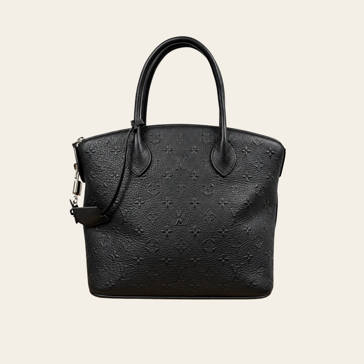 LOUIS VUITTON — Sac Lockit PM en cuir Monogram Revelation noir, taille PM