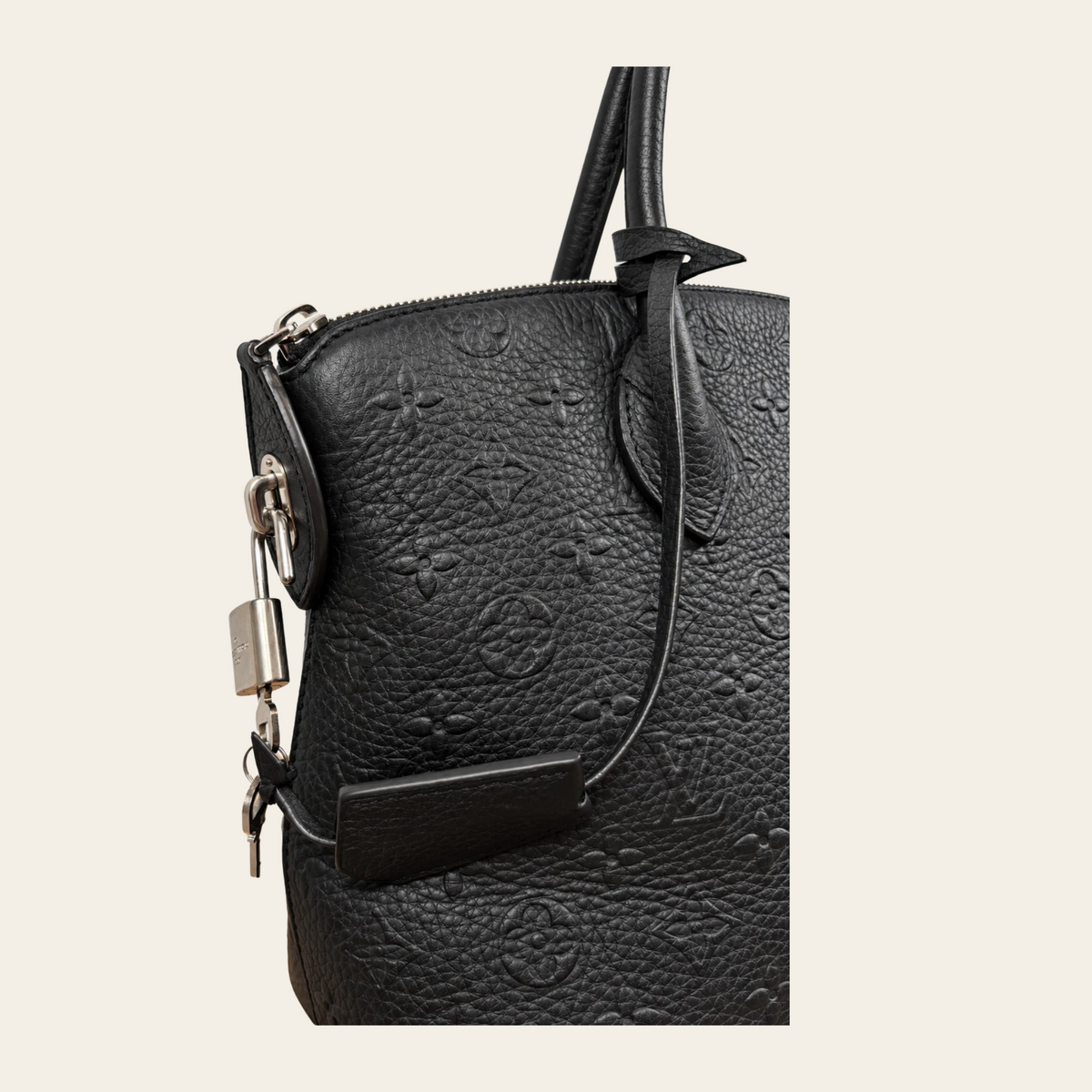LOUIS VUITTON — Sac Lockit PM en cuir Monogram Revelation noir, taille PM