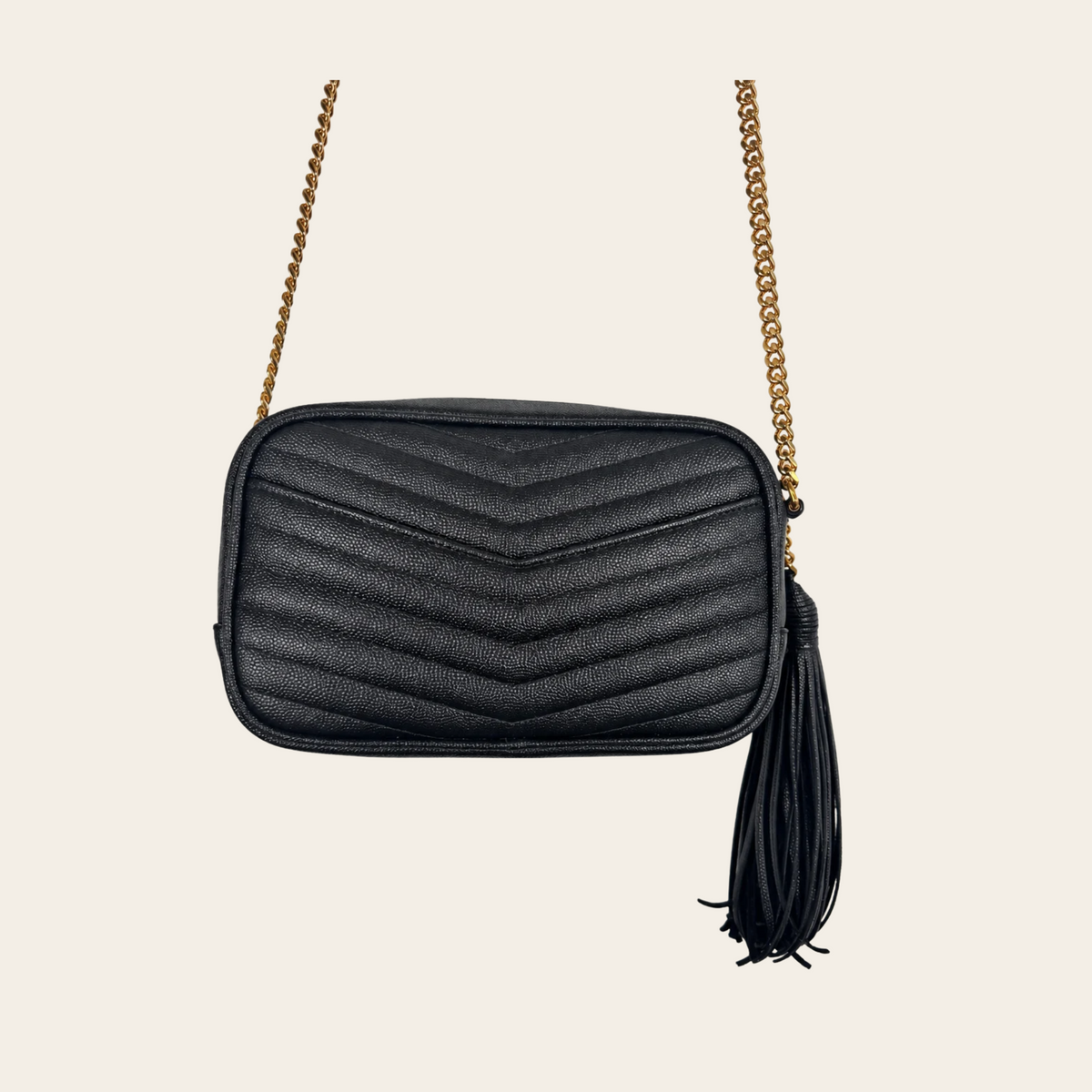 SAINT LAURENT — Sac Lou Camera en cuir grainé matelassé noir avec pompon