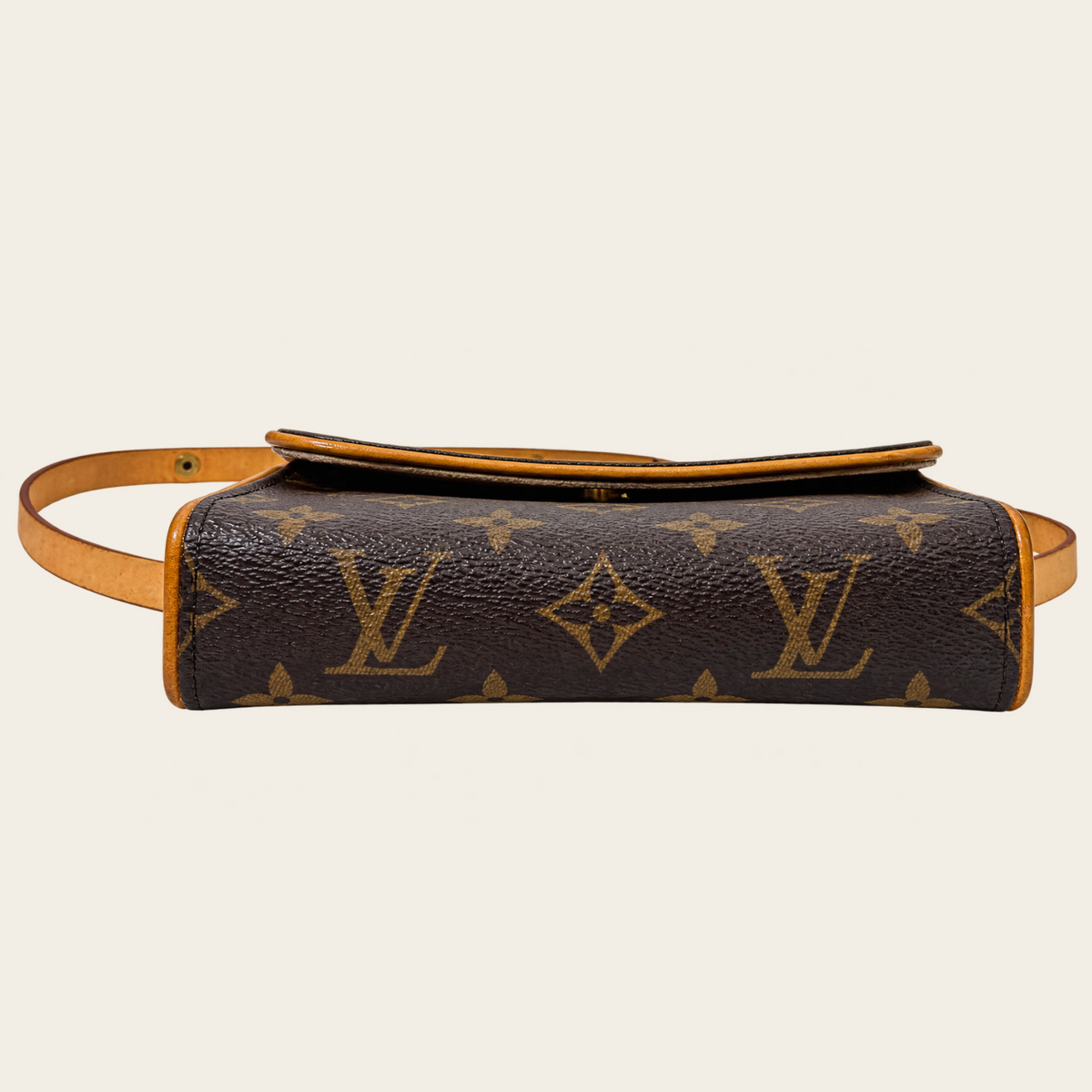 LOUIS VUITTON — Pochette Florentine discontinuée en toile Monogram avec ceinture amovible, taille XS