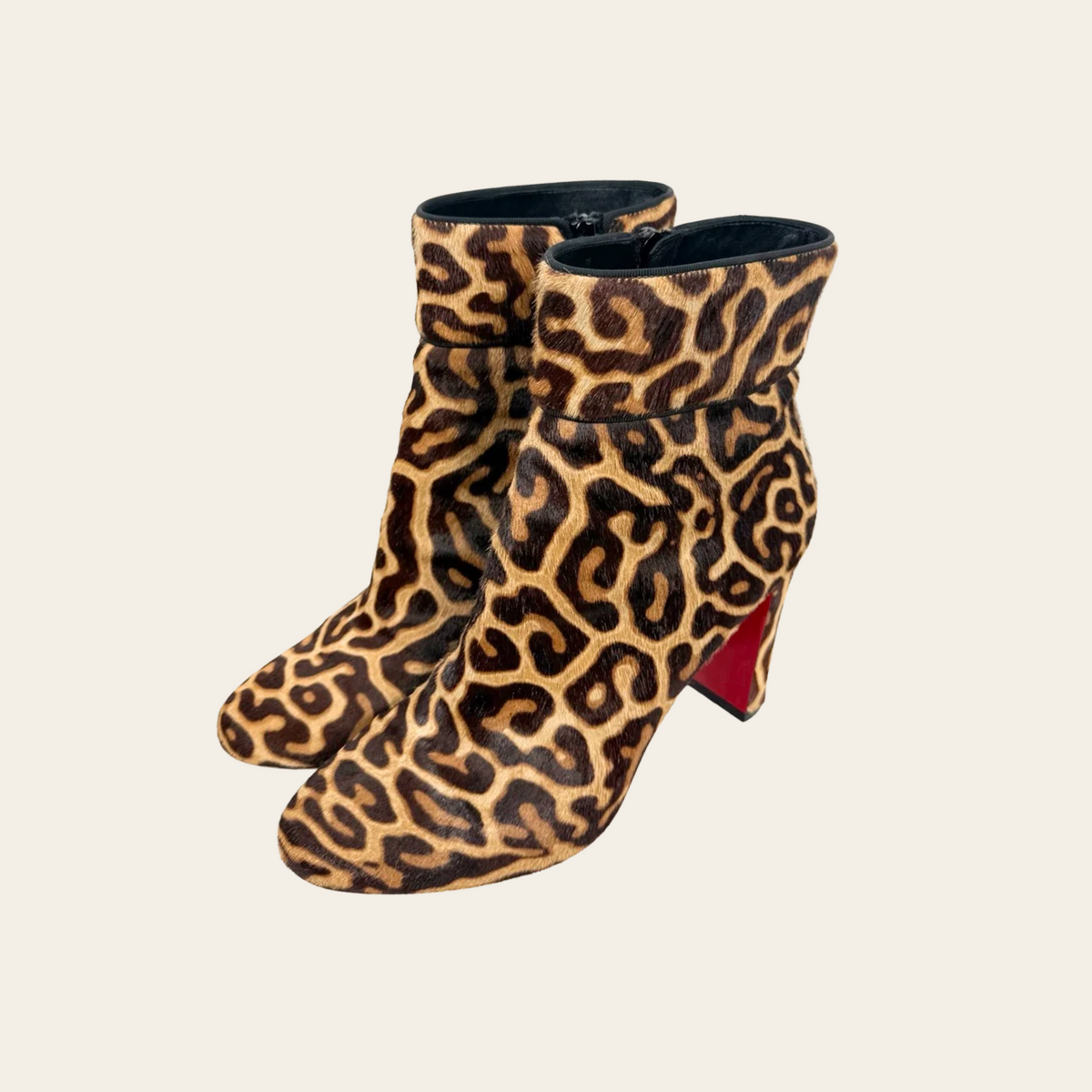 CHRISTIAN LOUBOUTIN — Bottines Moulamax 85 « Pony Miaou » en cuir à poil imprimé léopard, taille 40
