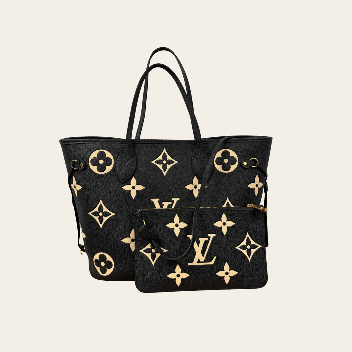 LOUIS VUITTON — Sac Neverfull MM en cuir Monogram Empreinte Giant noir et crème,