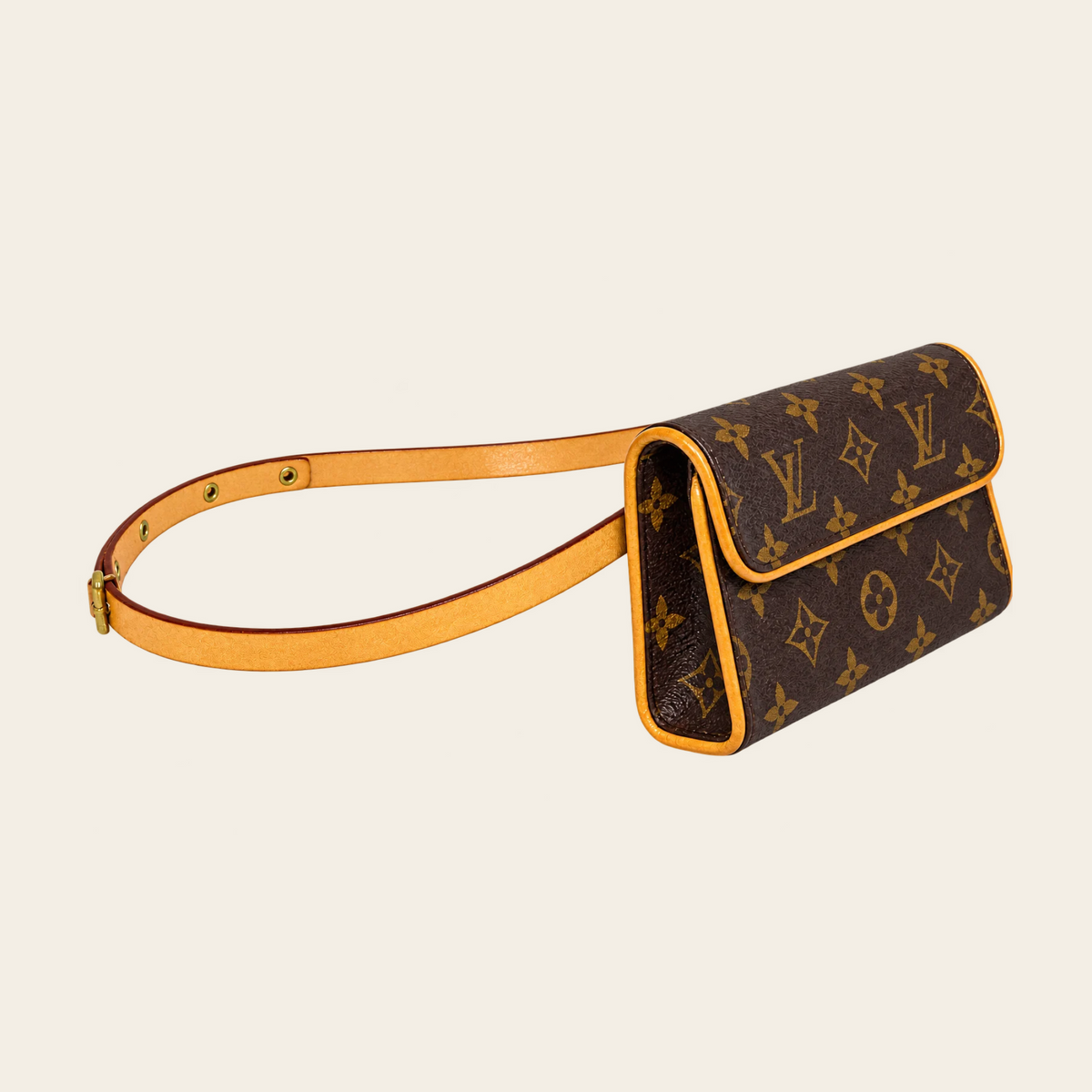 LOUIS VUITTON — Pochette Florentine discontinuée en toile Monogram avec ceinture amovible, taille XS