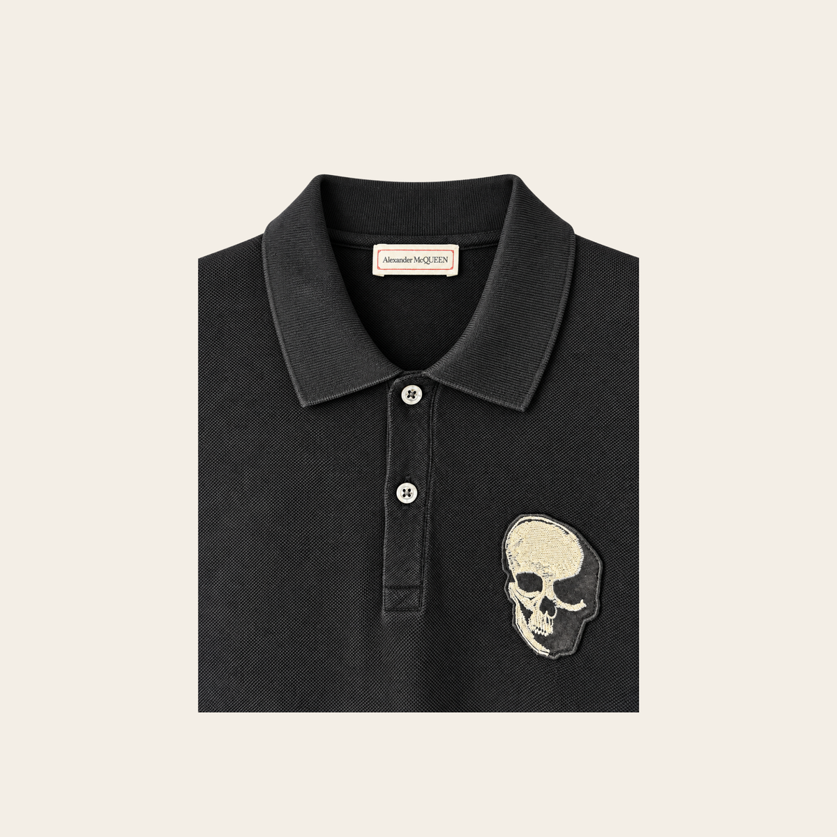 ALEXANDER McQUEEN — Polo noir à écusson Skull brodé, Taille XL
