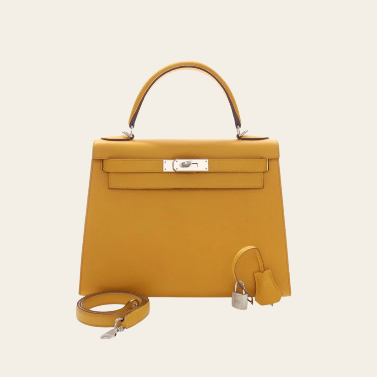 HERMÈS — Kelly 28 Sellier en cuir Epsom Jaune Ambre, quincaillerie palladiée