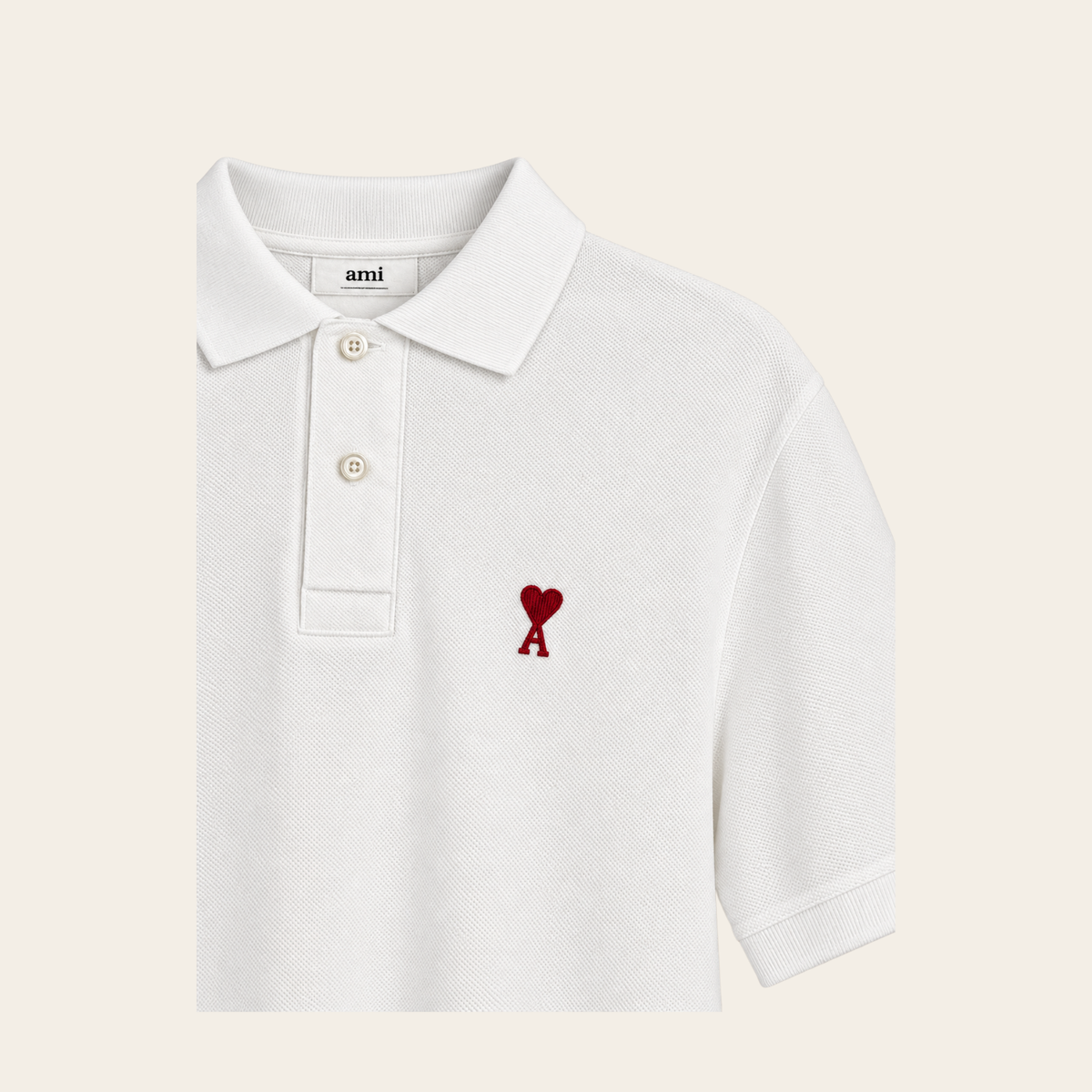 AMI PARIS – Polo Ami de Cœur blanc en coton biologique à logo rouge