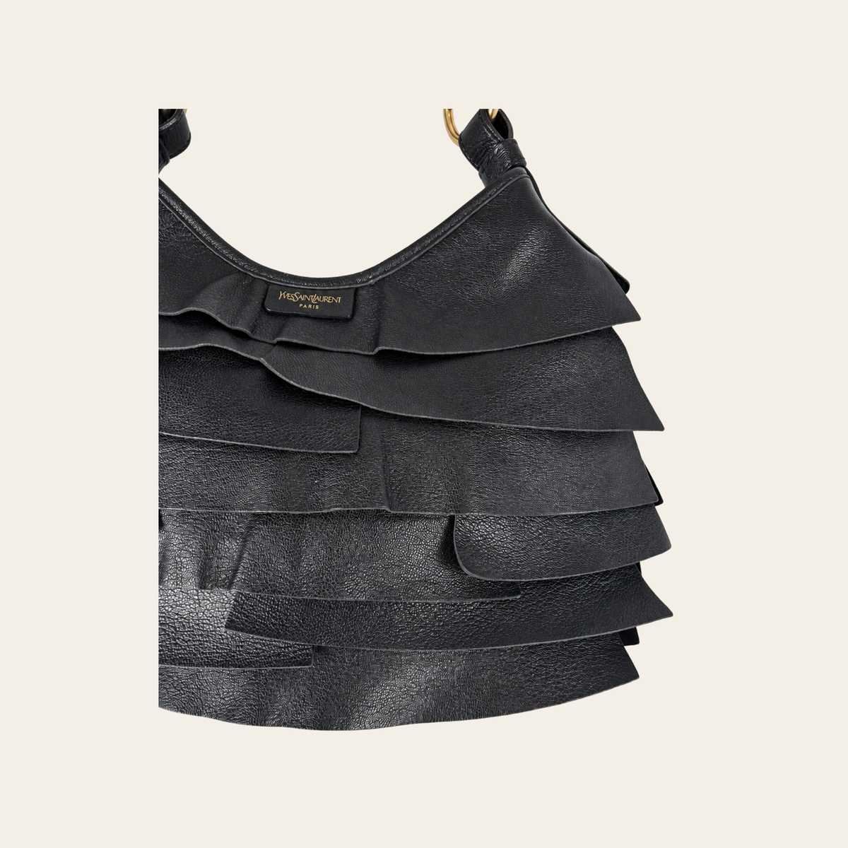 YVES SAINT LAURENT RIVE GAUCHE — Sac hobo St. Tropez en cuir noir à volants superposés