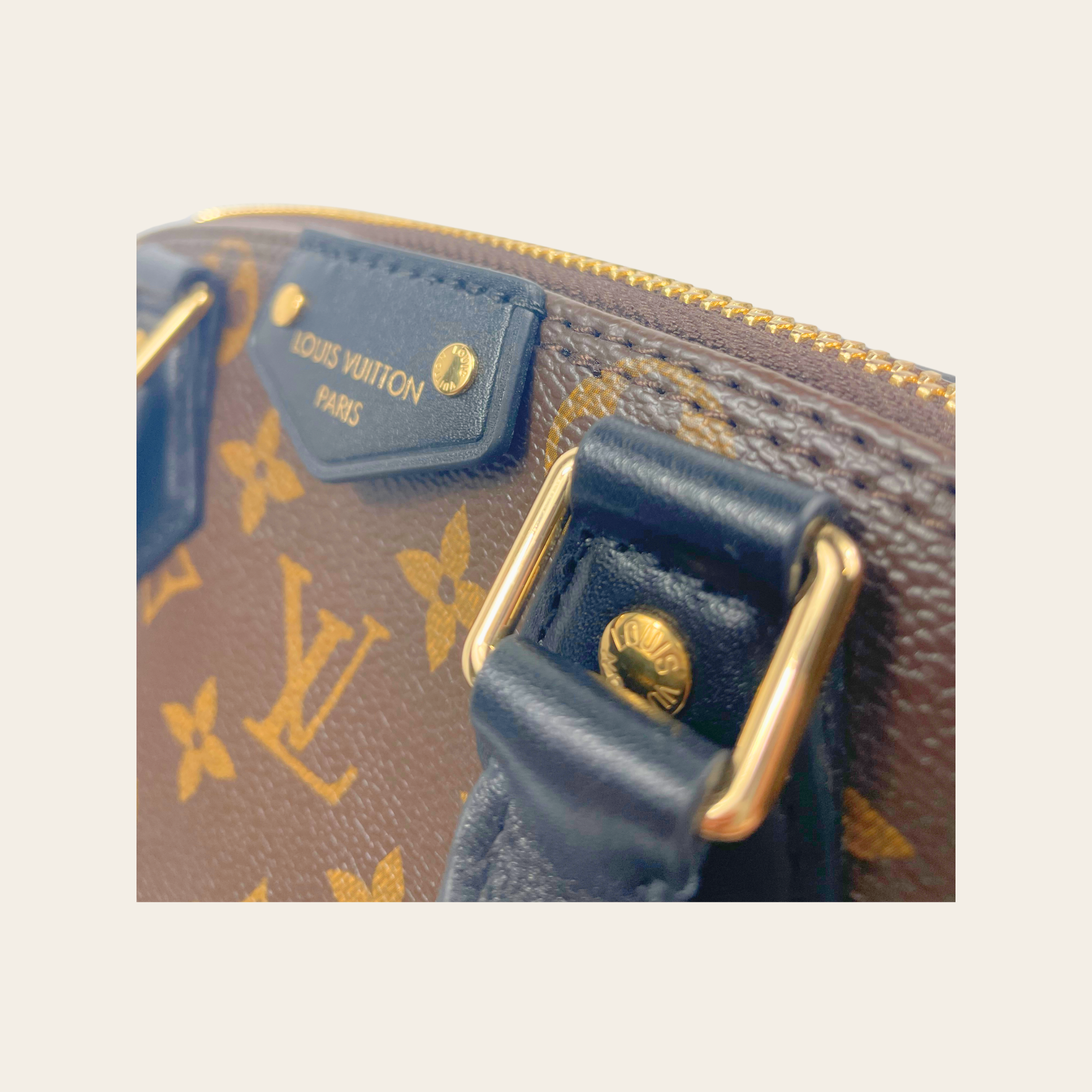 LOUIS VUITTON - Alma BB Monogram Noir avec Coins Métalliques