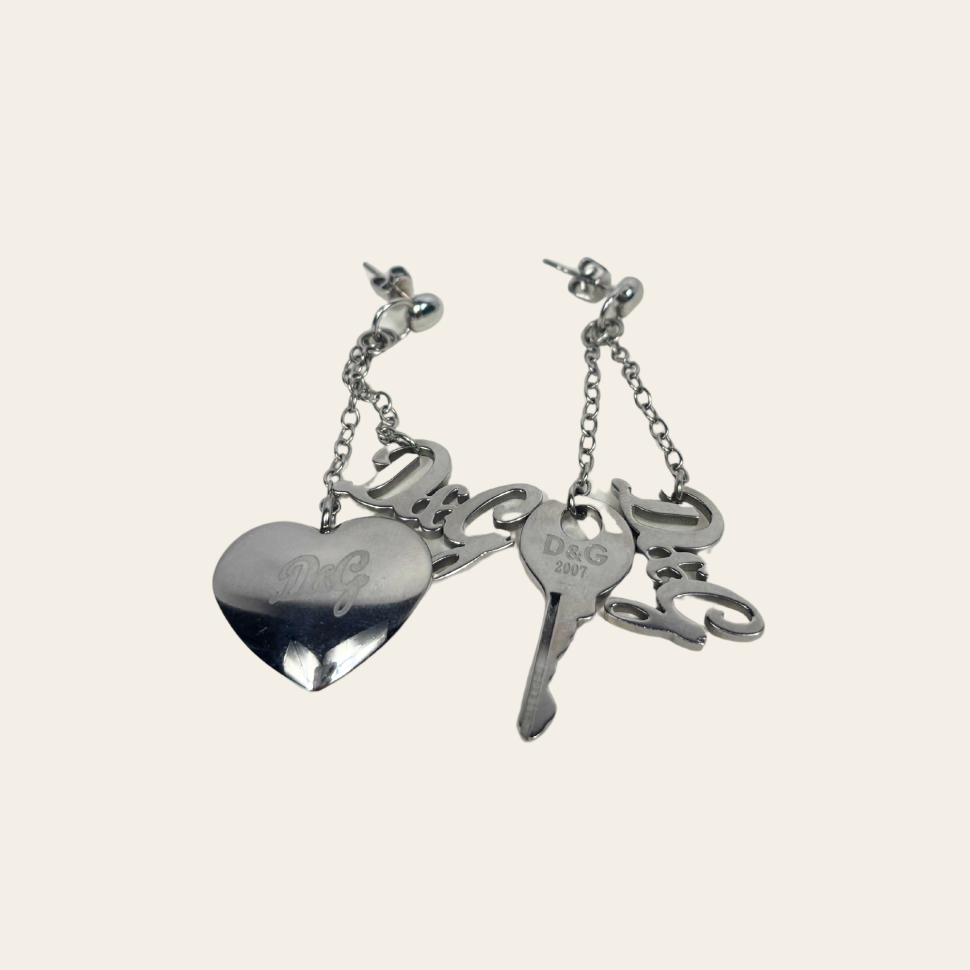 DOLCE & GABBANA – Boucles d'oreilles Logo, Cœur & Clé en métal argenté