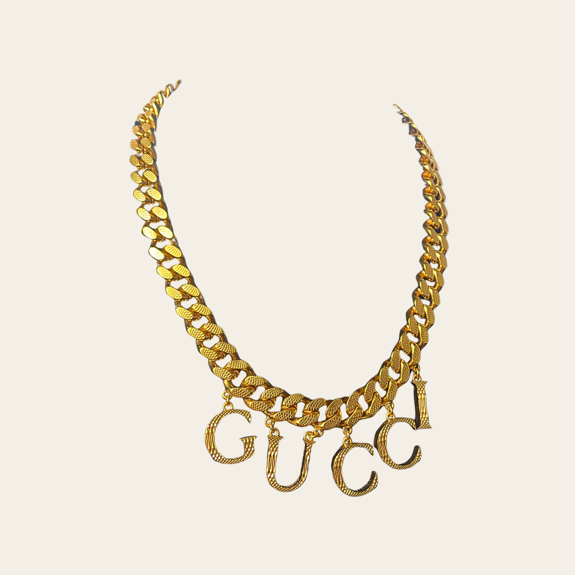 GUCCI - Collier Vintage “GUCCI Letter Charm Chain” Doré