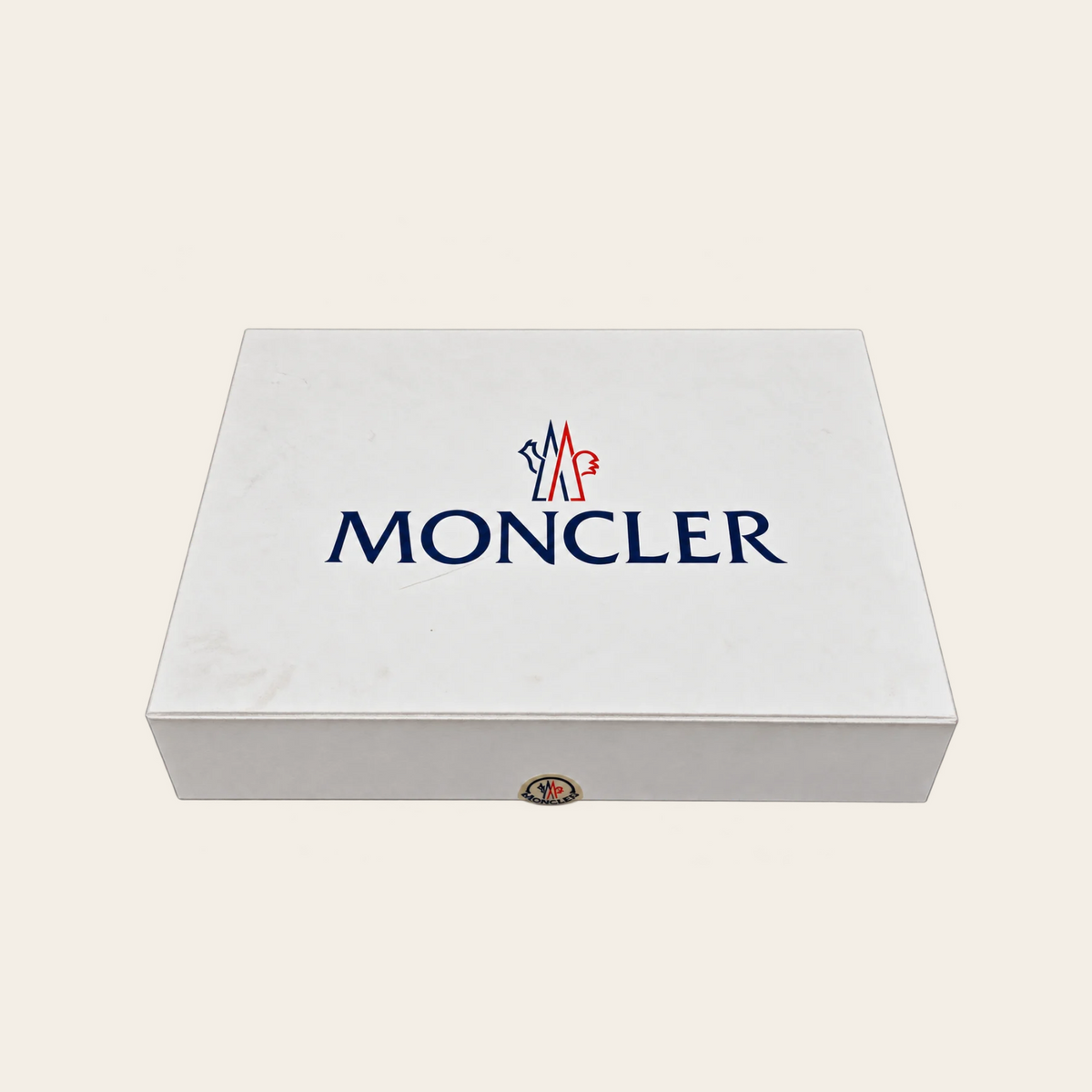 MONCLER — Cardigan Tricot en laine vierge bleu marine à devant matelassé et écusson signature, taille XL