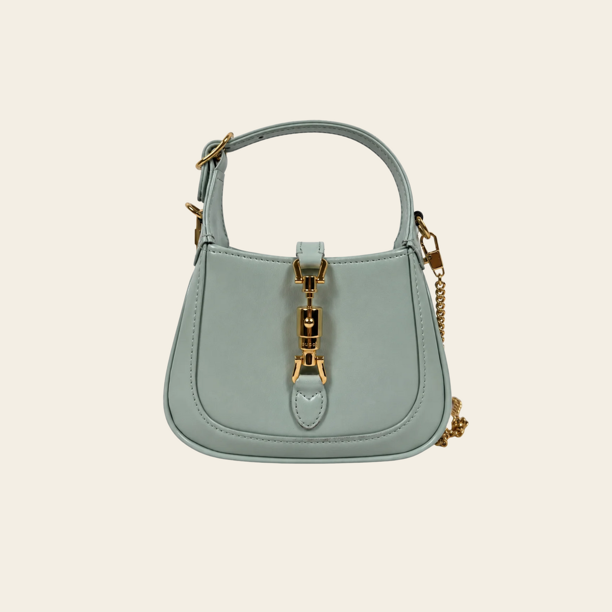 GUCCI — Sac Jackie 1961 Nano en cuir vert sauge avec fermoir piston doré et bandoulière chaîne, taille Nano