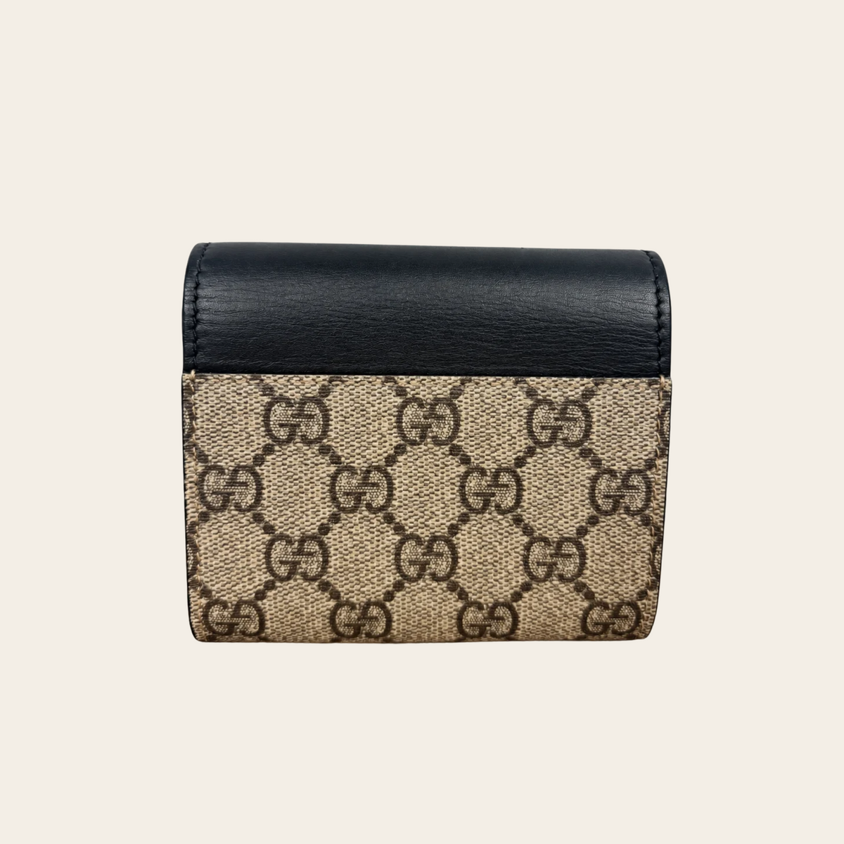 GUCCI — Portefeuille compact GG Supreme Padlock en toile beige et cuir noir