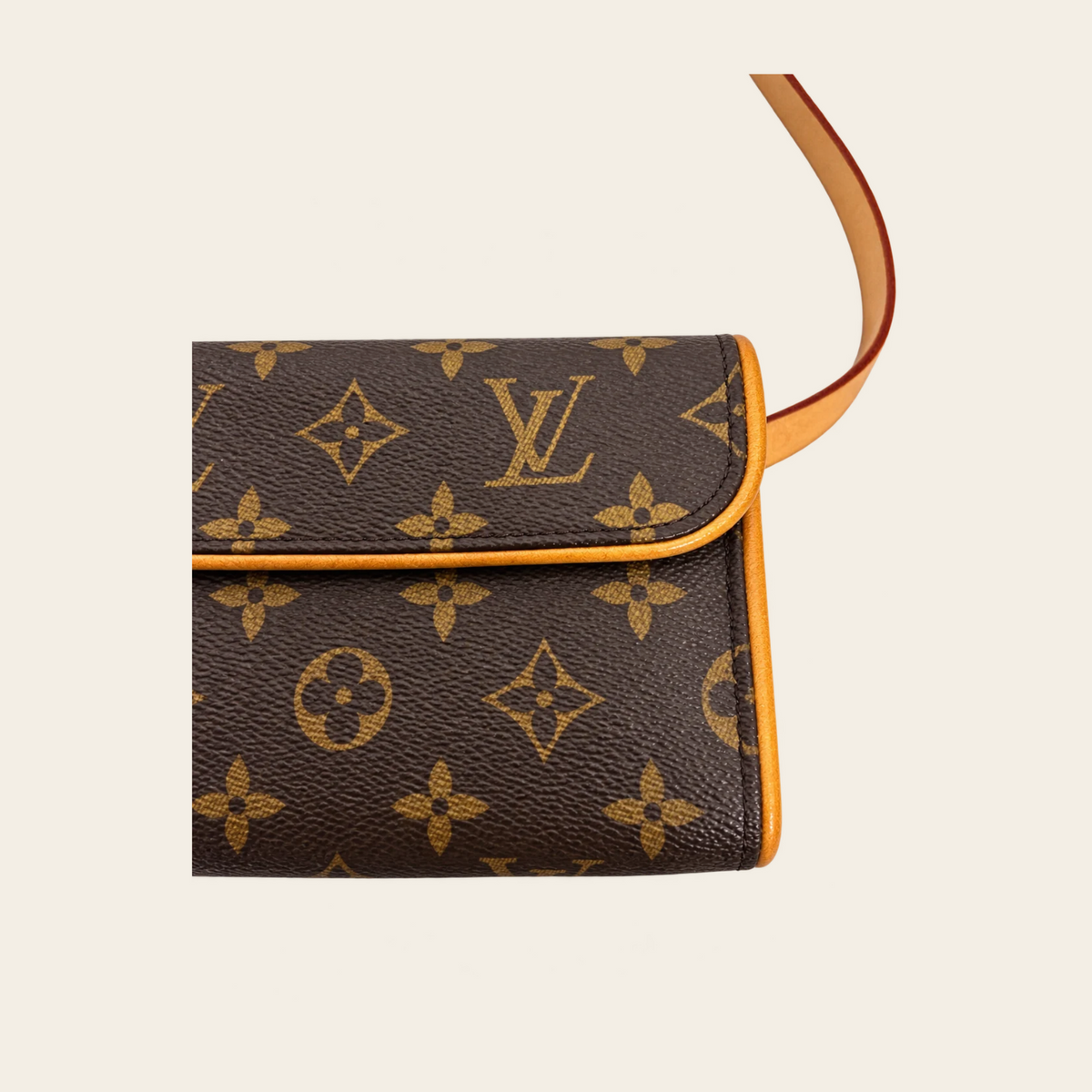 LOUIS VUITTON — Pochette Florentine discontinuée en toile Monogram avec ceinture amovible, taille XS