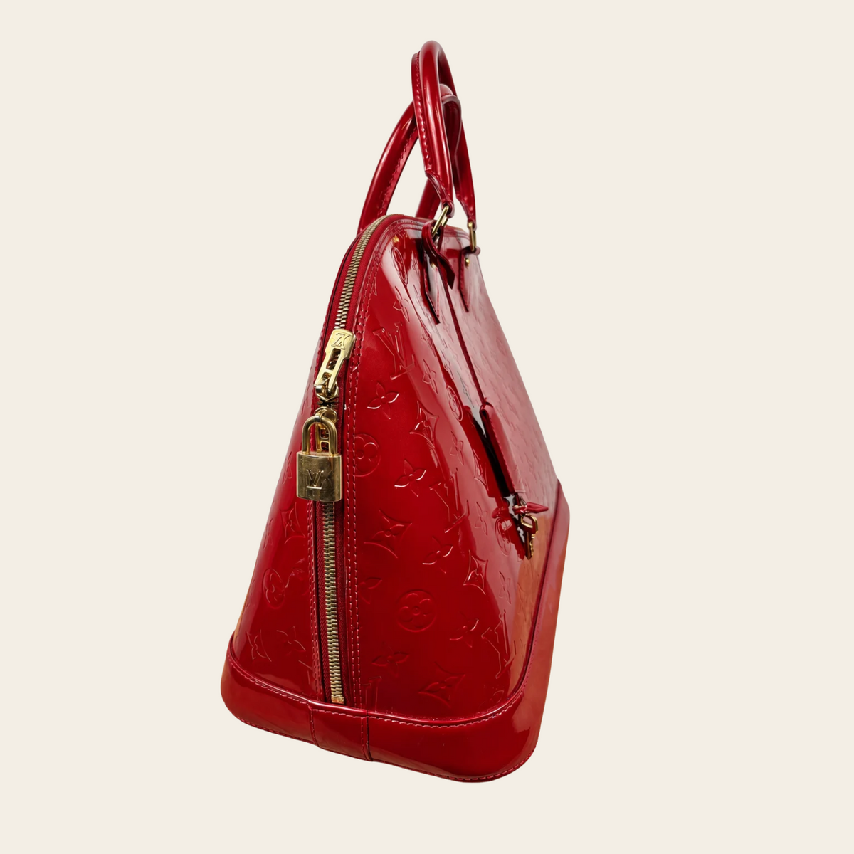 LOUIS VUITTON — Sac Alma GM en cuir Monogram Vernis Pomme d'amour