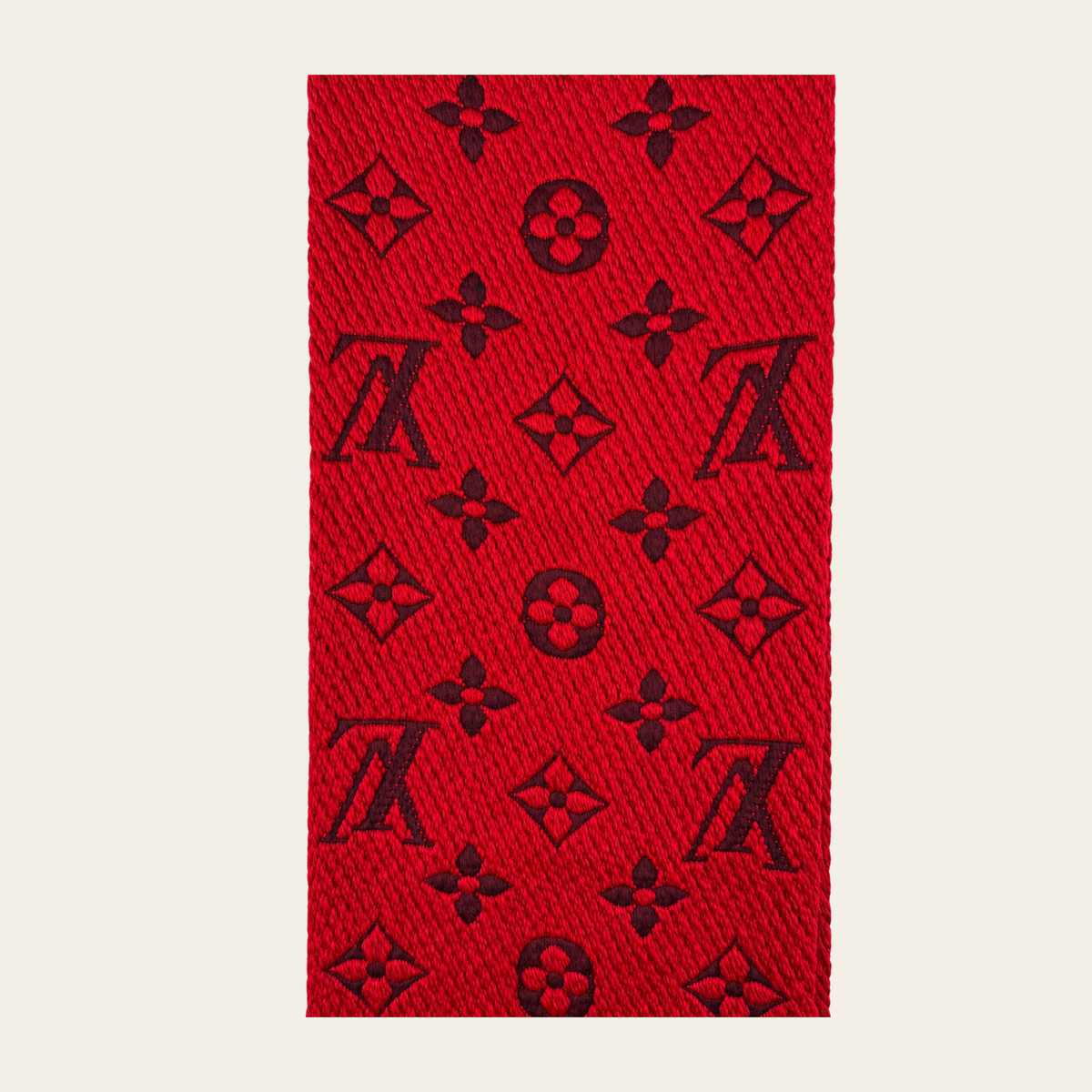 LOUIS VUITTON — Écharpe Logomania en laine et soie rouge rubis à motif Monogram jacquard et franges