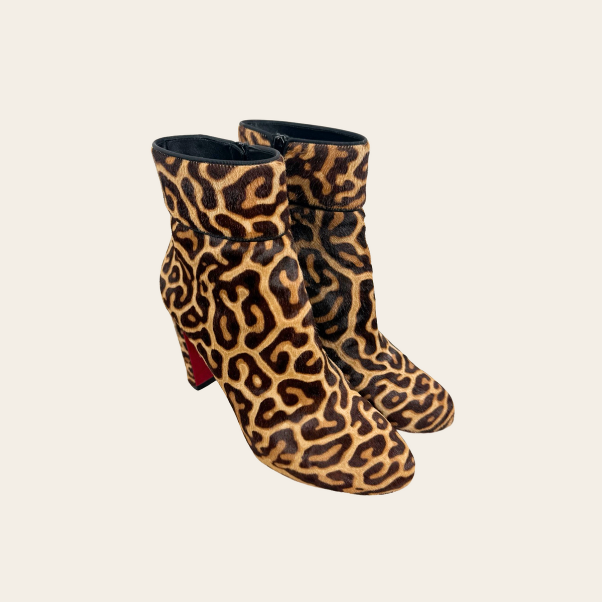 CHRISTIAN LOUBOUTIN — Bottines Moulamax 85 « Pony Miaou » en cuir à poil imprimé léopard, taille 40
