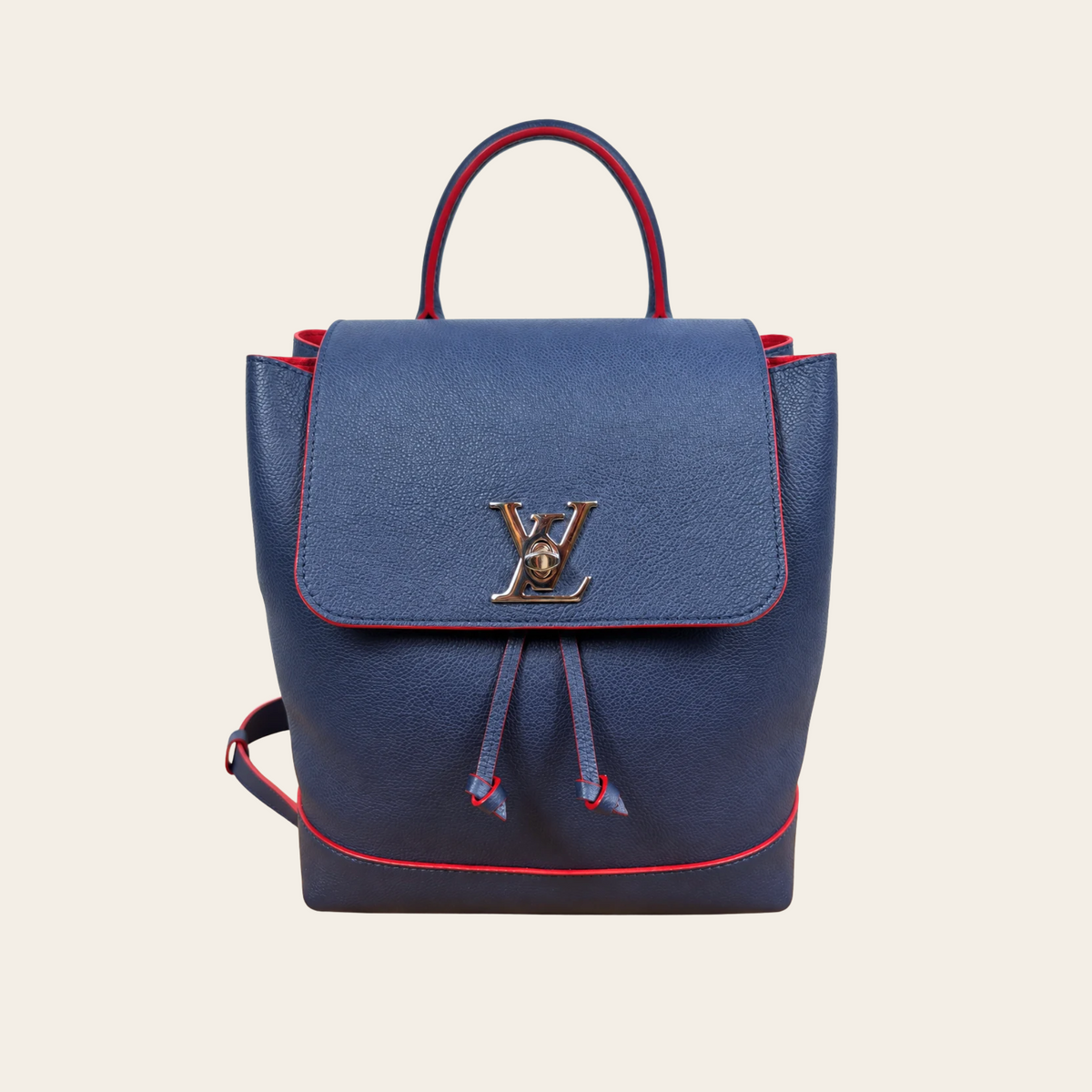 LOUIS VUITTON — Sac à dos Lockme en cuir grainé bleu marine et rouge