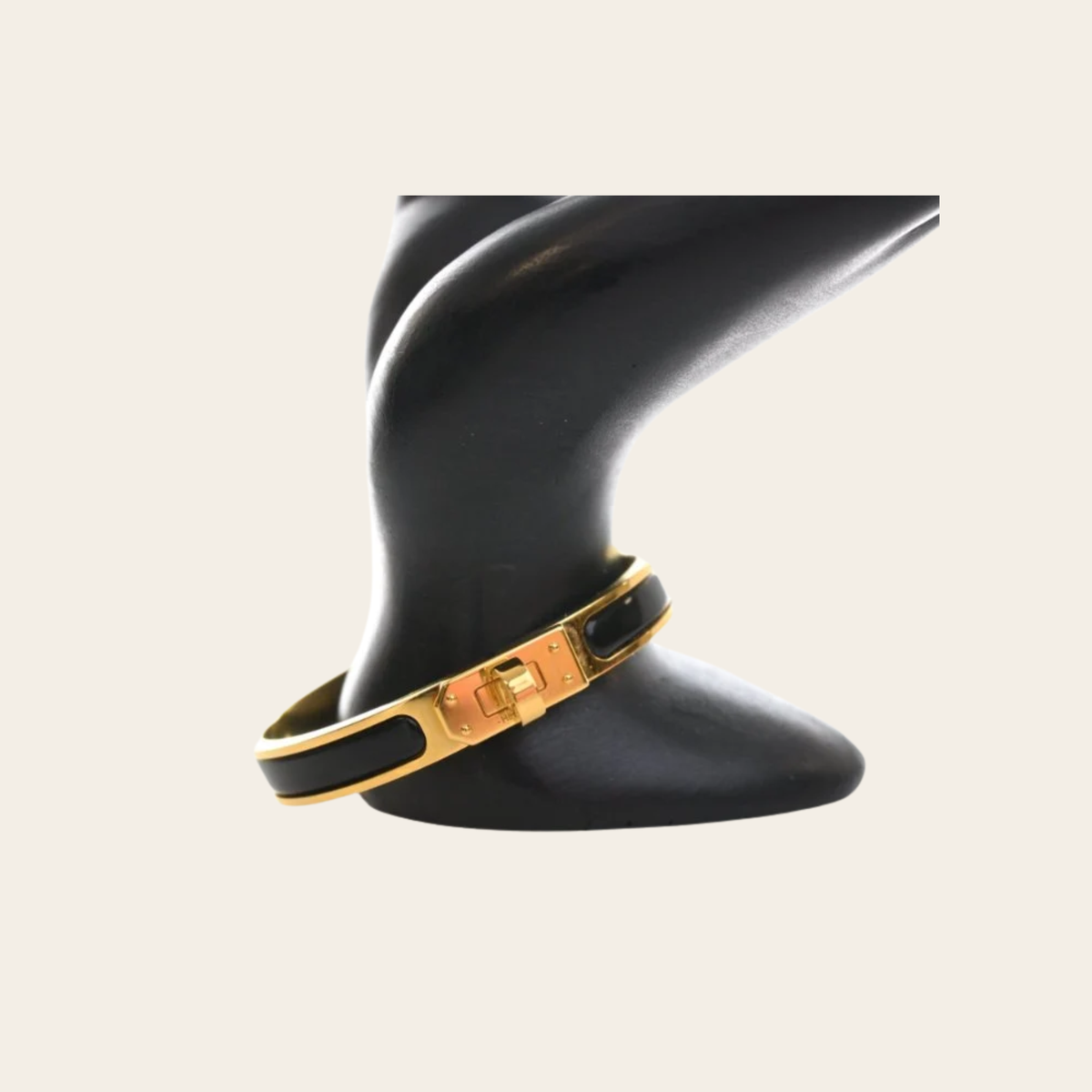 HERMÈS – Bracelet Mini Clic Kelly Noir et Doré