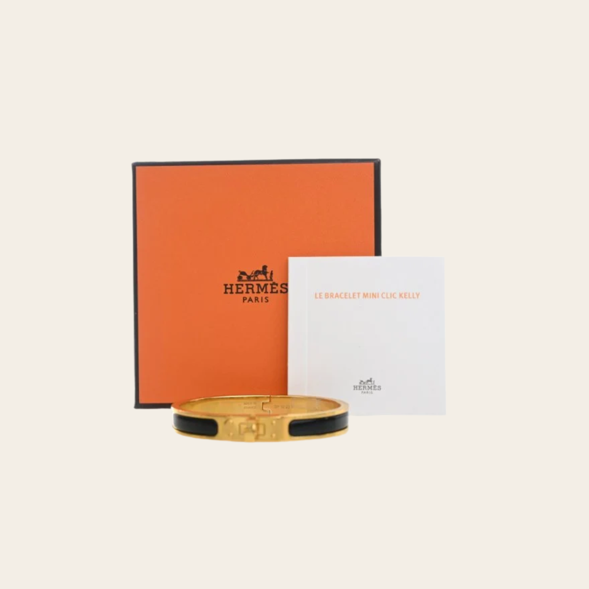 HERMÈS – Bracelet Mini Clic Kelly Noir et Doré