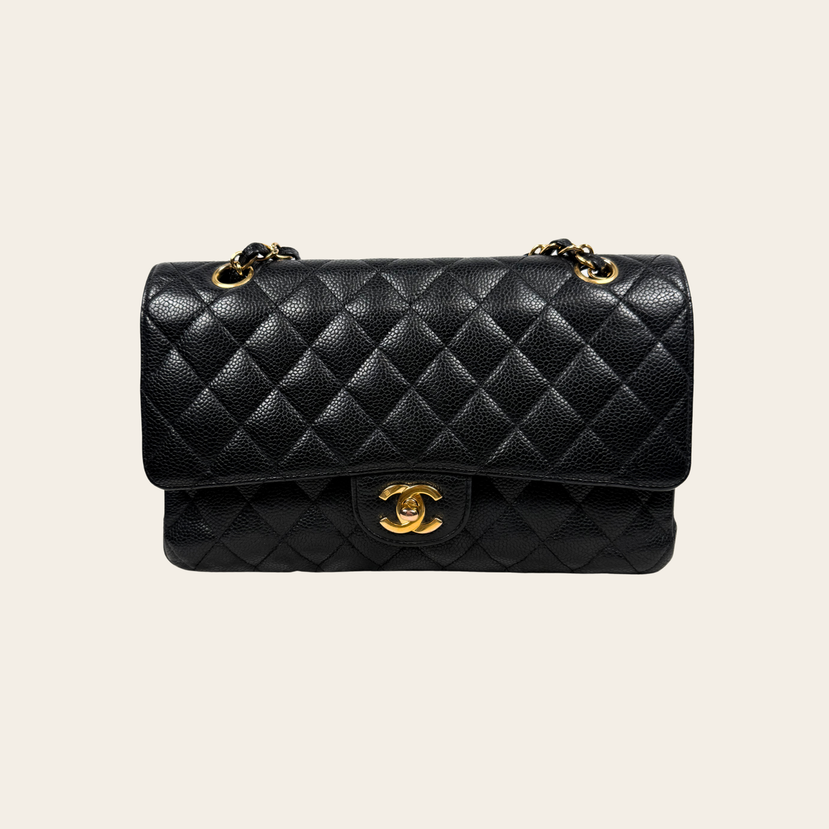 CHANEL VINTAGE – 24 k Classic Double Flap Medium en cuir caviar matelassé – Noir & doré