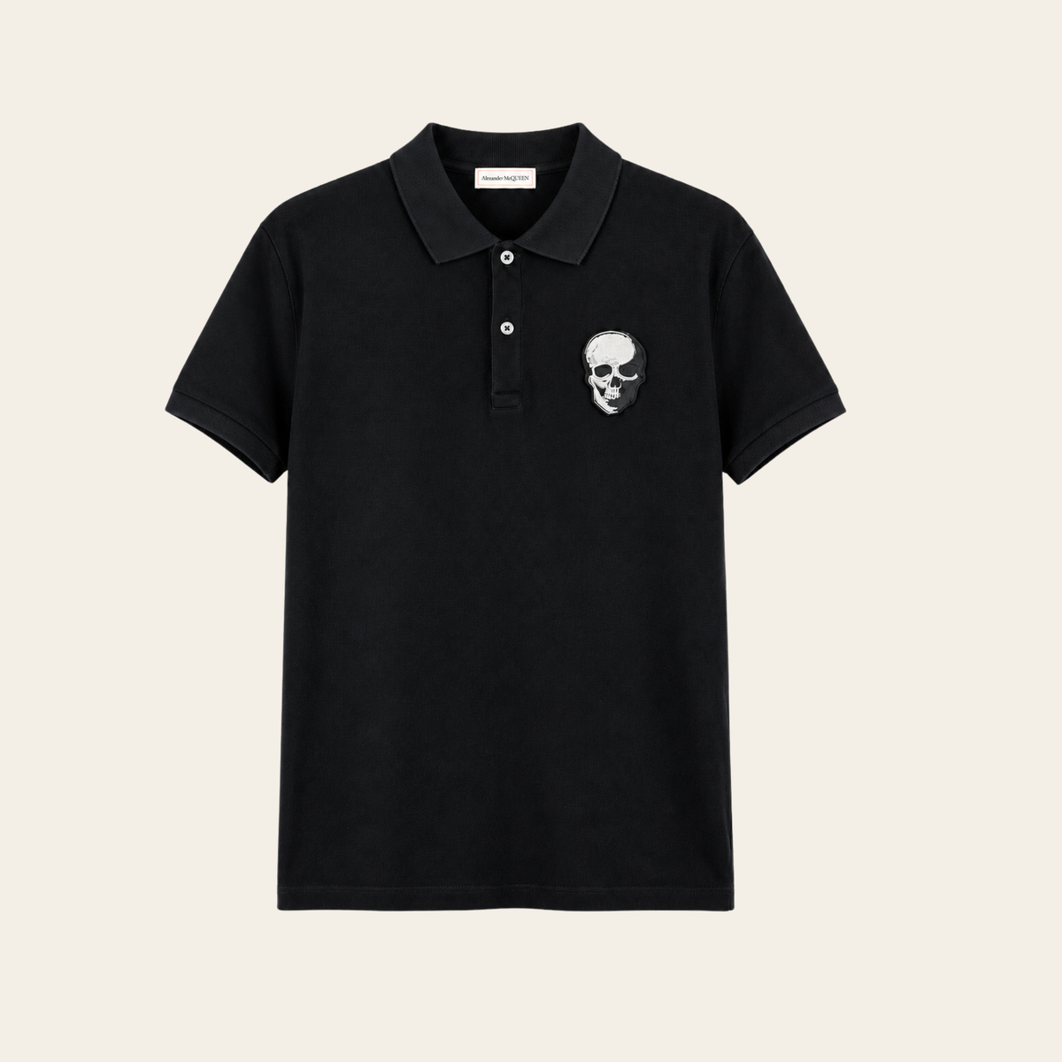 ALEXANDER McQUEEN — Polo noir à écusson Skull brodé, Taille XL