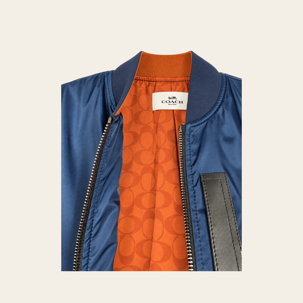Coach – Blouson aviateur MA-1 en nylon bleu marine et cuir, M