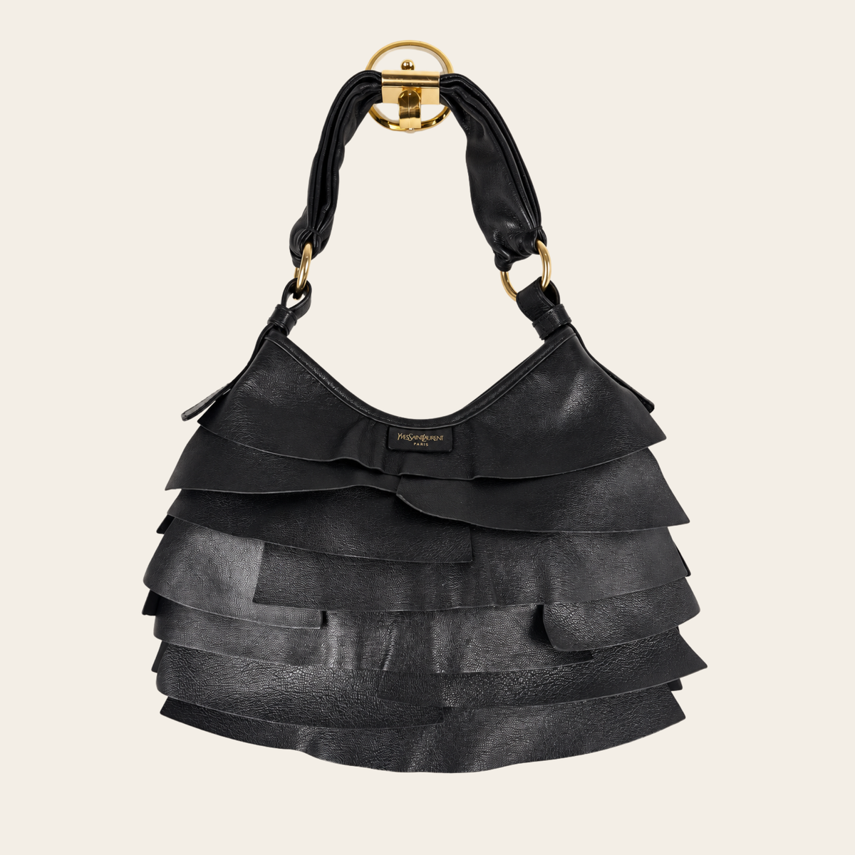 YVES SAINT LAURENT RIVE GAUCHE — Sac hobo St. Tropez en cuir noir à volants superposés