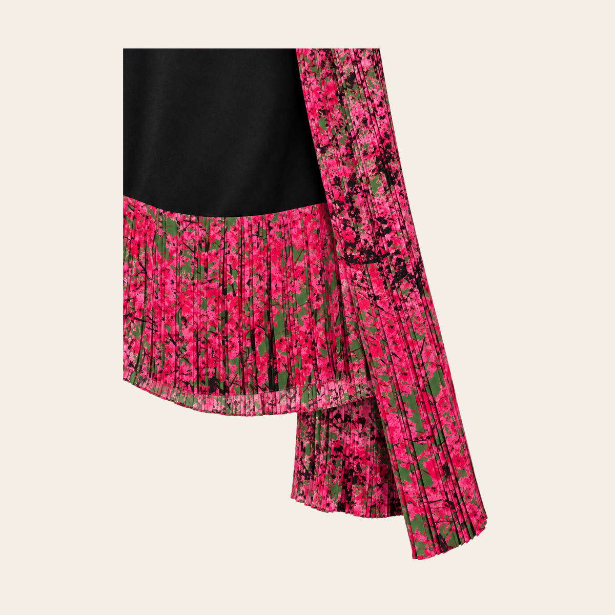 CHRISTIAN DIOR — Jupe plissée asymétrique en soie noire et rose, taille 36